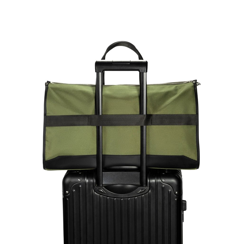 Unique 2-in-1 garment weekender bag with large capacity, trolley sleeve, hidden pockets, waterproof material.