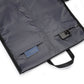 Unique 2-in-1 garment weekender bag with large capacity, trolley sleeve, hidden pockets, waterproof material.